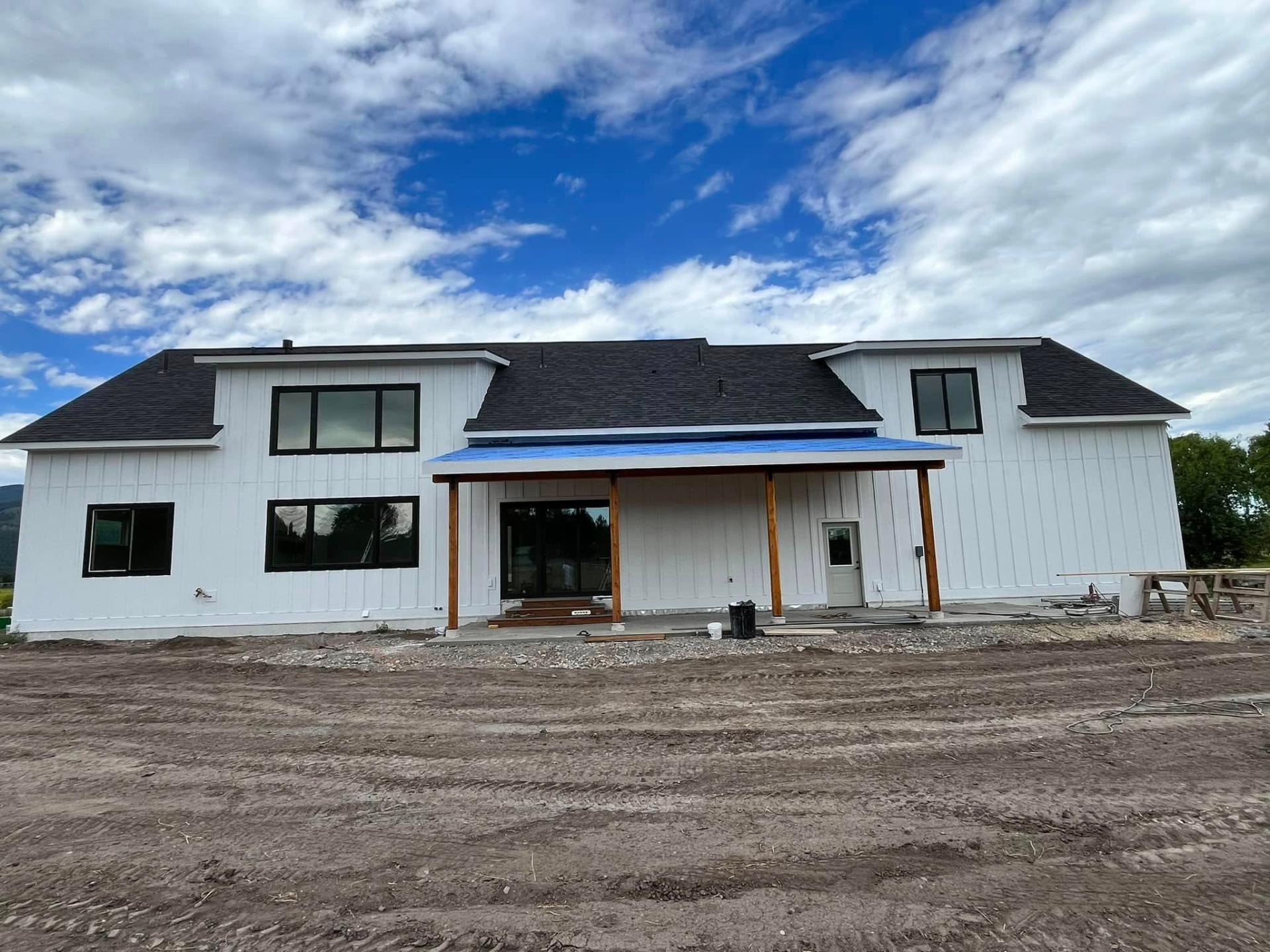 New construction farmhouse exterior paint by Treeline Painting